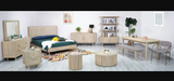 Luxury bedroom setup featuring Genesis Queen Bed with decor styling