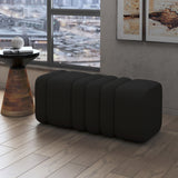 Regal large ottoman in black bouclé fabric front view