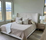 Gia 2 drawer nightstand front view in modern bedroom setting