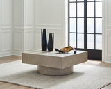 Jorielyn square cocktail table in a modern living room setting