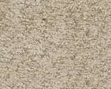 Close up of desert color upholstery fabric on Joseph ottoman