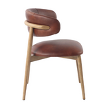 Front view of Milo leather dining chair at Couch9 Calgary furniture store