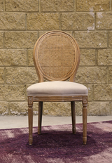 Front view of Napoleon rattan dining chair at Couch9 Calgary furniture store