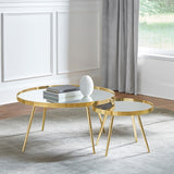 Rose nesting tables with gold finish in a modern living room setting