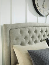 ROSEN King Bed angled view showing upholstered headboard and frame design