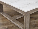 Alaska coffee table styled with decor in a contemporary space