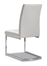 Side view of Dino armless dining chair in white at Couch9 Calgary furniture store
